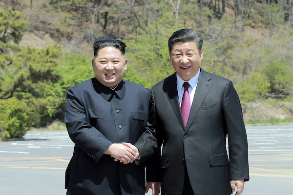 北韓領導人金正恩與中國國家主席習近平會晤歷史畫面/網路圖片